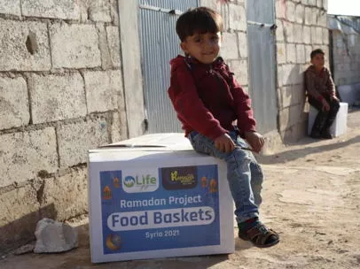 Family receiving Ramadan basket